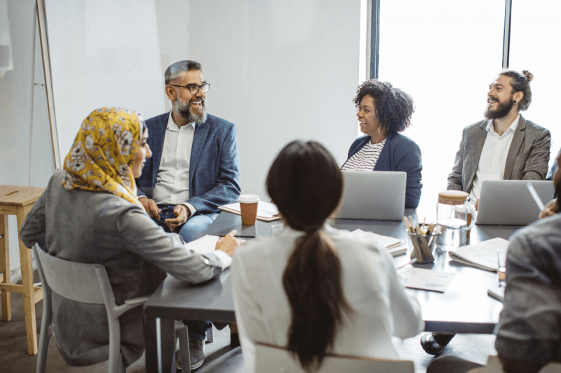 team meeting at desk