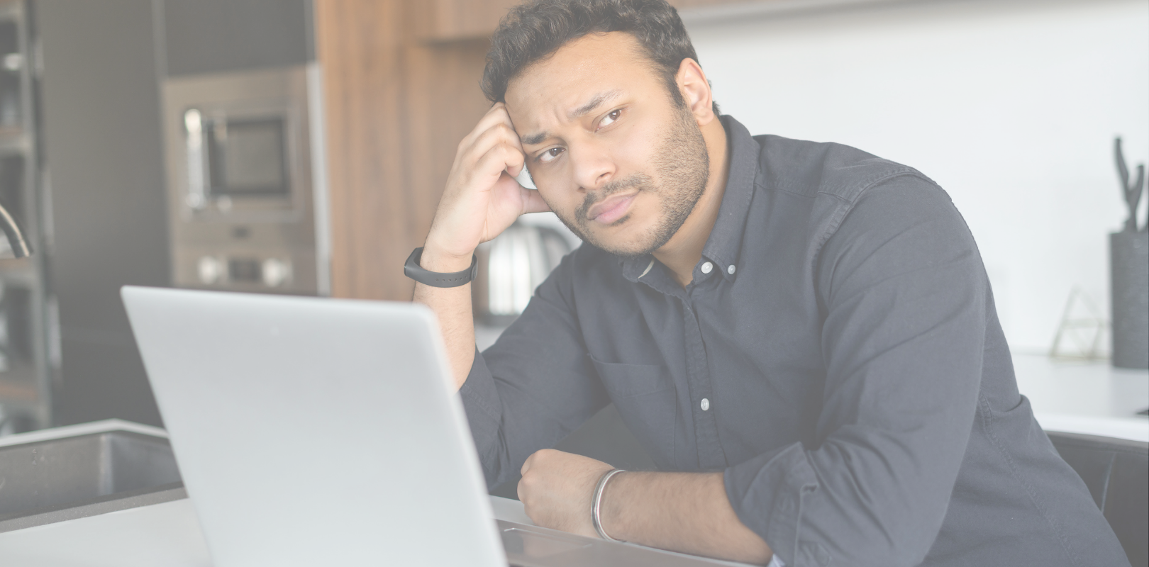 man on computer UIF Halal Financing FAQ